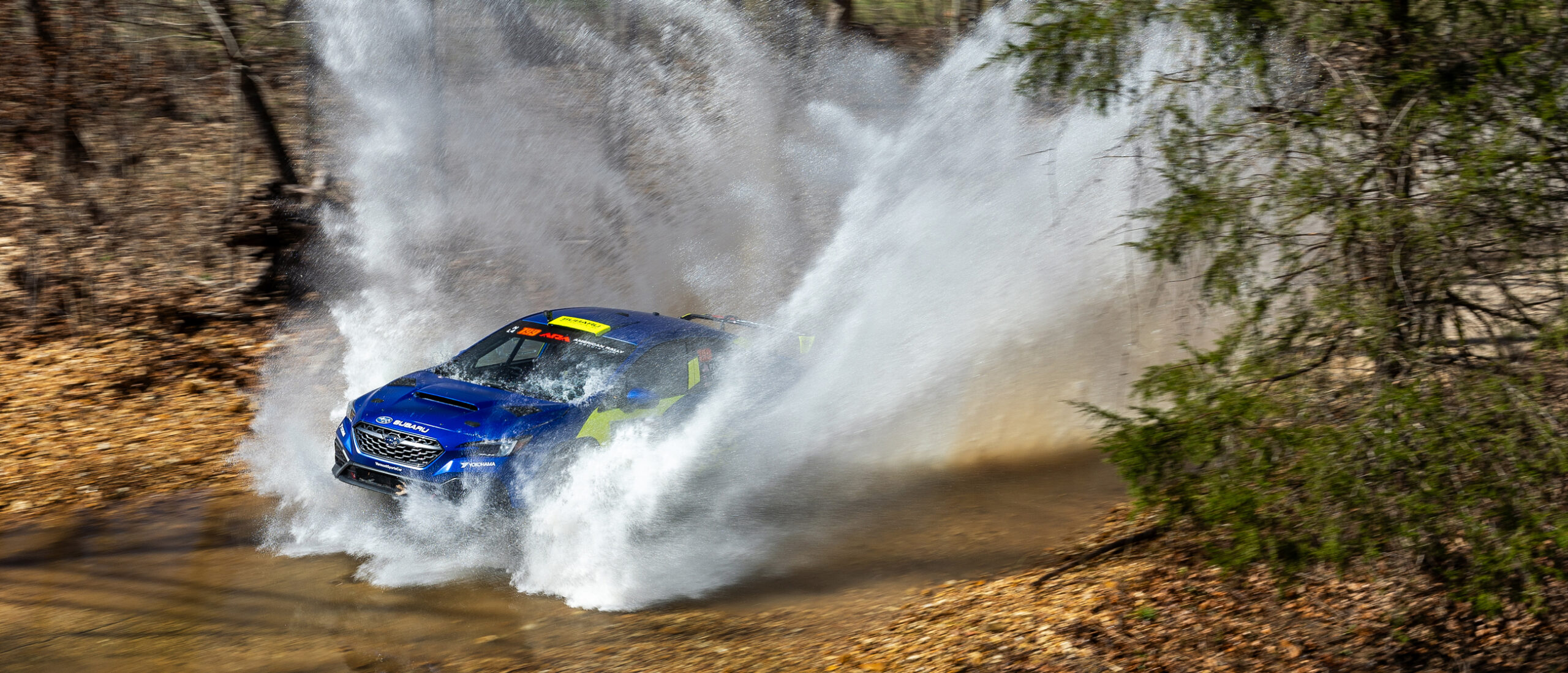 Travis Pastrana Blasts Through Water at 100AW scaled